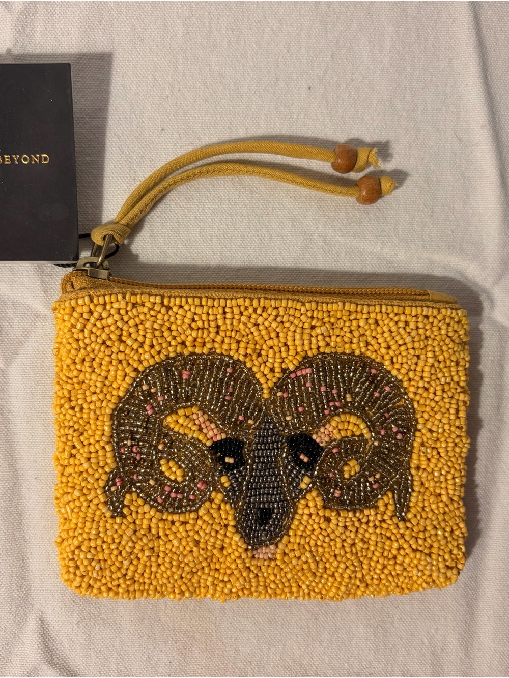 Beaded Yellow Wristlet Clutch with Ram Motif